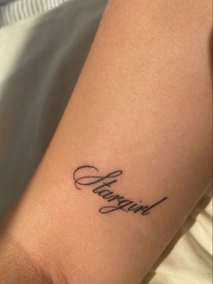 Stargirl tattoo Small Calligraphy Tattoo, Calligraphy Arm Tattoo, Fine Line Calligraphy Tattoo, Stargirl Tattoo Design, Fine Lining Tattoo, Fine Line Tattoo Aesthetic, Aesthetic Fine Line Tattoos, Small Tattoo Fonts, Daydreamer Tattoo