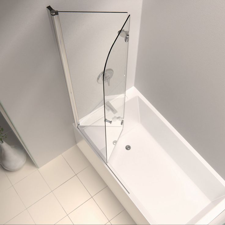 a white bath tub sitting inside of a bathroom