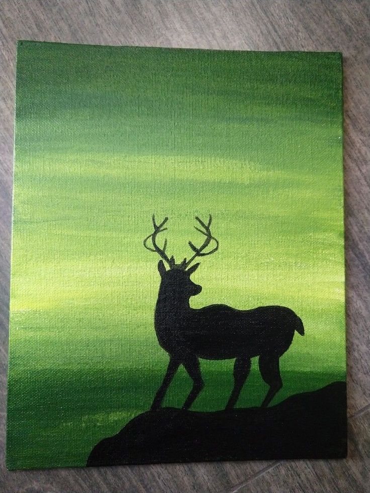 an acrylic painting of a deer standing on a hill with green sky in the background