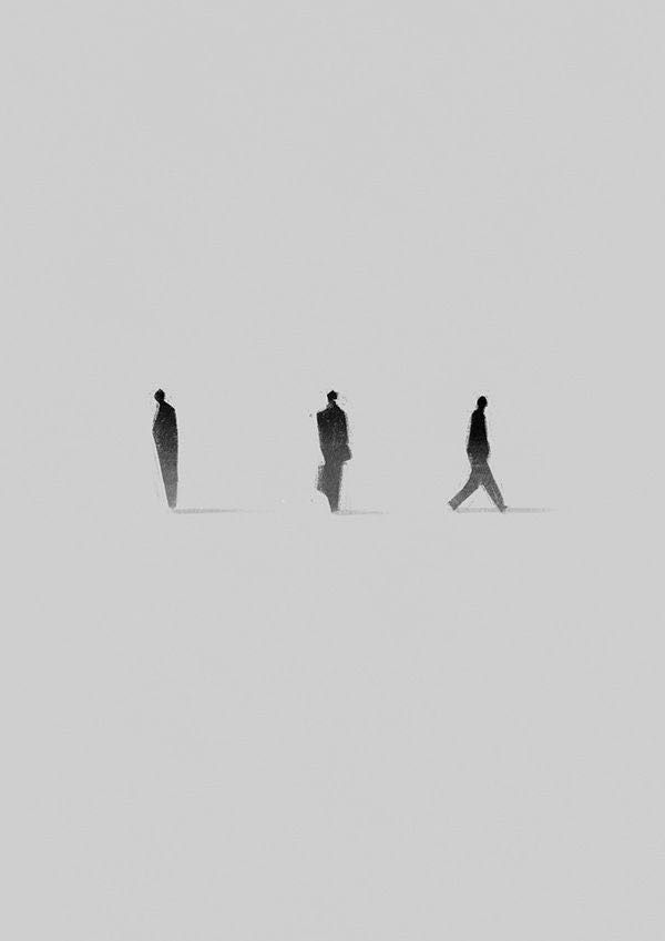 three people are walking in the snow