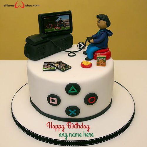 a cake with a man sitting on top of it, holding a video game controller