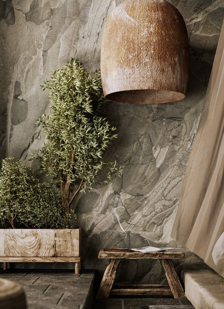 a room with stone walls and plants in wooden boxes on the floor next to a window