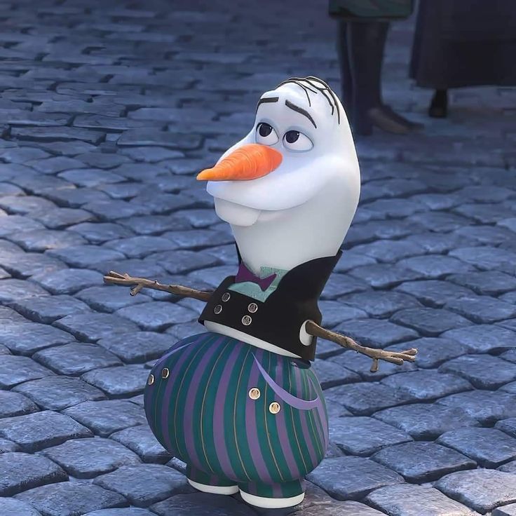 a cartoon character is standing on a cobblestone street with an orange nose and black jacket