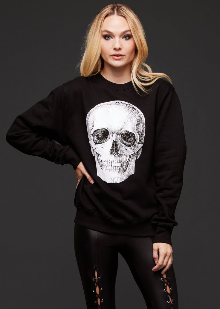 Keep cozy and comfy while you add more skulls to your sweater collection! This rad skull sweatshirt is an essential layering piece for the season! The sweater features a white skull design in the front, a boucle french terry fabric, long raglan sleeves, a boat neck neckline and a generous cuff on sleeve and waist hem. The relaxed fit makes it a stylish cold weather layer. Style with faux leather pants, skirts and skinny jeans for the perfect every day look or with sweatpants for comfy weekends a Goth Sweater, Black Lace Choker Necklace, Edgy Fits, Goth Pants, Skeleton Sweatshirt, Black Lace Choker, Skull Sweatshirt, Skull Sweater, Fur Leather Jacket