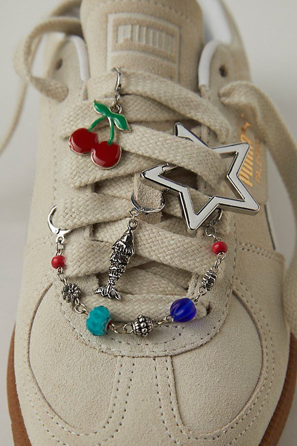 Add a little something special to your shoe game with this set of charms featuring dangly details, drapey chains, and defined pins for the perfect finishing touch. | Shoe Charm & Pin Pack by Free People in Red Shoe Clips Sneakers, Shoe Charm Ideas, Bubble Shoes Charms, Shoes With Charms, Shoe Charms Diy, Shoe Lace Charms, Sneaker Charms, Interesting Accessories, Shoes Charm