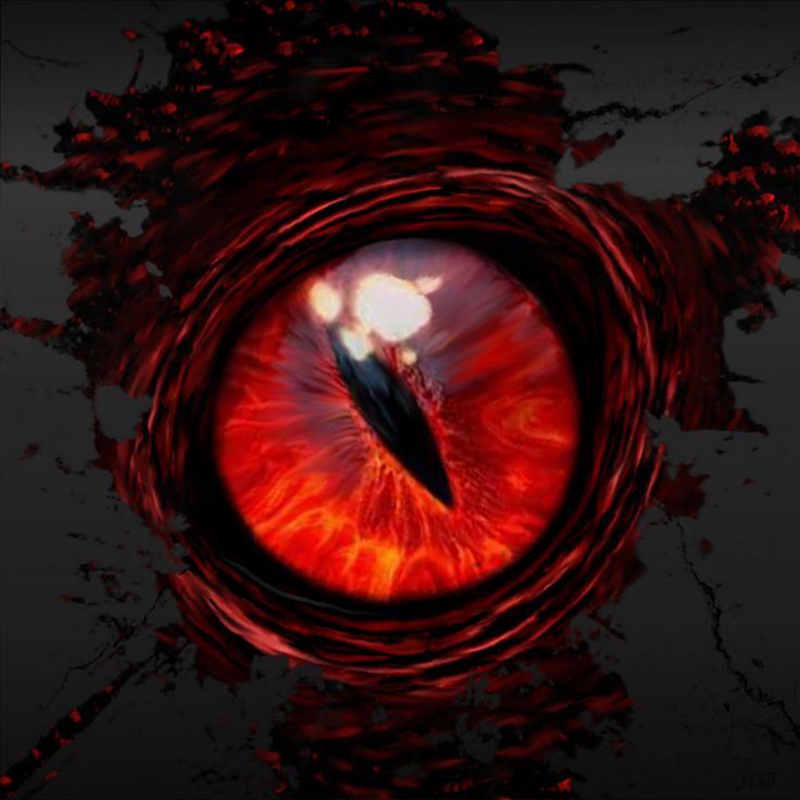 an eyeball is shown with red and black streaks on it's irises