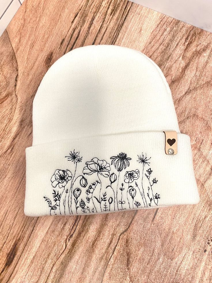 Casual White Beanie As Gift, Beanies Embroidery, Embroidery Winter Hat, Cheap Embroidered Beanie Hats, Things To Embroider On, One Size Embroidered Beanie Hats, Beanie Aesthetic, Casual Embroidered Winter Beanie, Beanie Embroidery