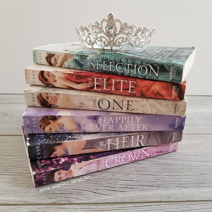 a stack of books with a tiara on top of one that says selection, little one, happily after her crown