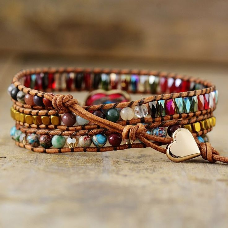 Unleash Your Earthy Style with the Ardent Wrap Bracelet Introducing the Ardent Wrap Bracelet, a unique handmade accessory that combines the warmth of soft brown leather with the earthy power of Jasper stones. This one-of-a-kind bracelet, and a perfect addition to your jewelry collection. Handcrafted with Love Wrap Bracelet is handmade by skilled artisans, ensuring that your piece is special and one of a kind. The Ardent Wrap Bracelet features a stunning heart-shaped Jasper centerpiece, symbolizi Wrap Armband, Heart Center, Earthy Style, Imperial Jasper, Bracelet Heart, Heart Symbol, Boost Your Energy, Life Force, 7 Chakras