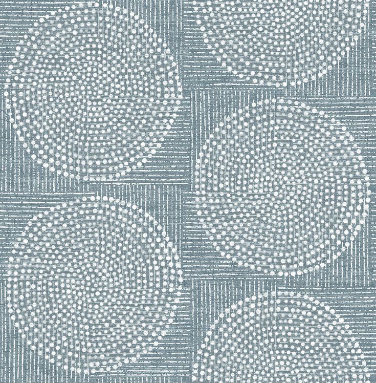 a blue and white wallpaper with circles on it