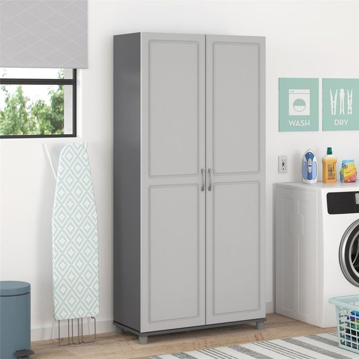 a laundry room with a washer and dryer