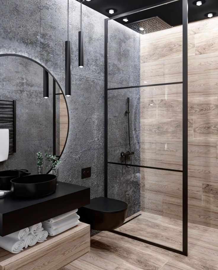 a modern bathroom with black and white accessories