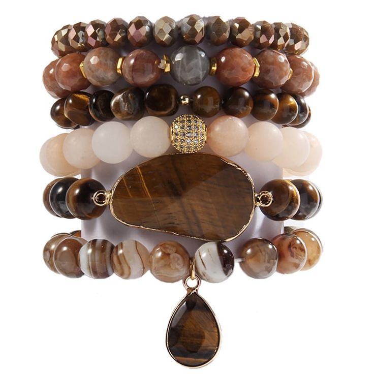 PRICES MAY VARY. [ 6 Pcs Natural Stone Beaded Bracelets/Bangle Set ]:Made of 100% Natural Stone, Tiger eyes, Turquoise, Jasper, Agate, Ceramics, High quality beads, Crystal,Semi-Precious Gemstone and Gemstone which are high quality materials,Smooth and comfortable. Bohemian bracelets sets are threaded with strong elastic string. Durable and flexible.The addition of the bangle makes the bracelet both vintage and stylish.With 6 individual single loop bracelets, you can choose to wear one or severa Loop Bracelets, Boho Beaded Bracelets, Stone Beaded Bracelets, African Beaded Bracelets, Bracelets Sets, Boho Bracelets Stack, Stone Bead Jewelry, Tiger Eyes, Healing Gemstone Bracelets