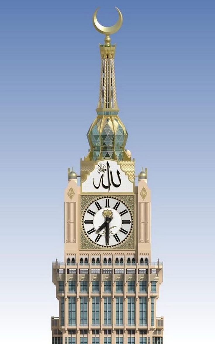 a large clock tower with a crescent on top