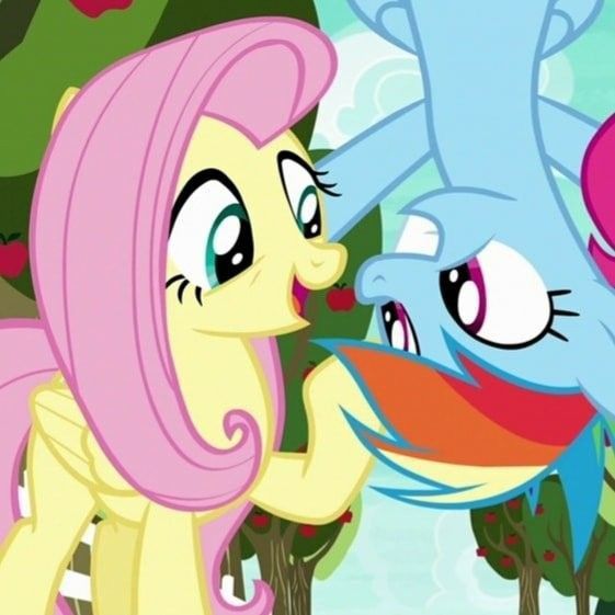 pinkie and flutter face to face in front of trees