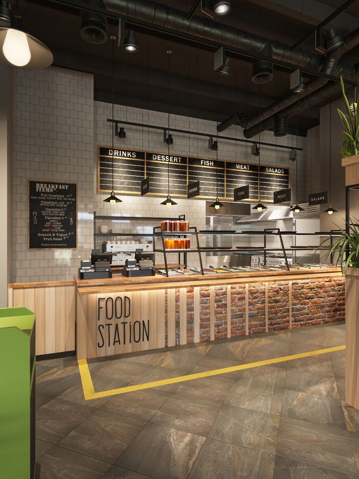 the interior of a restaurant with an open counter