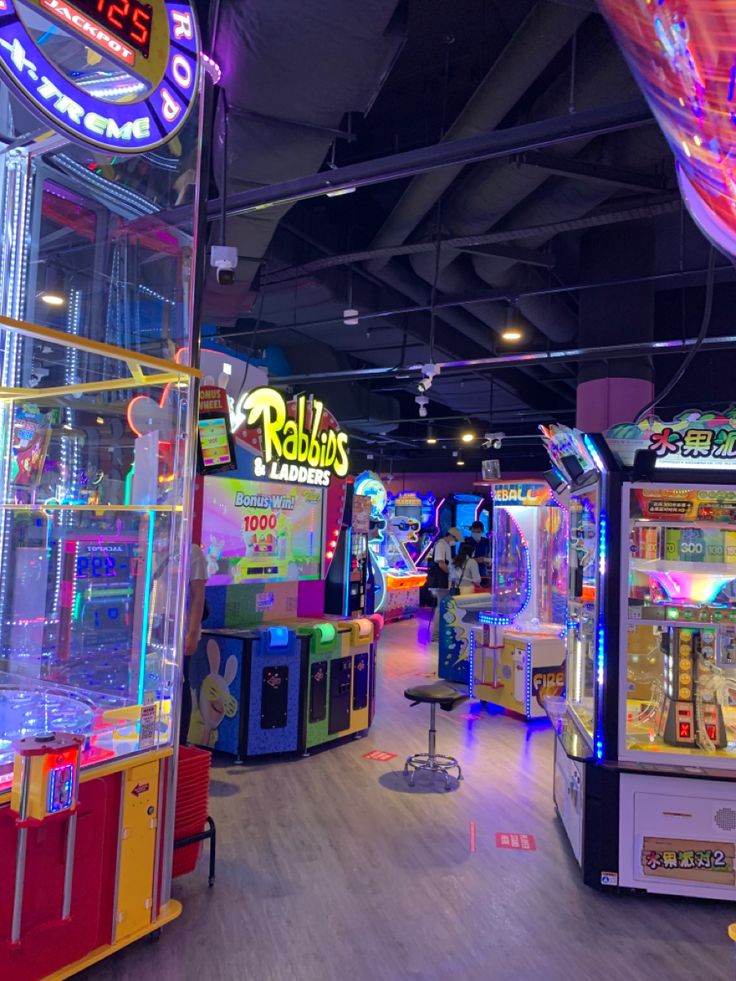 an arcade filled with lots of colorful machines