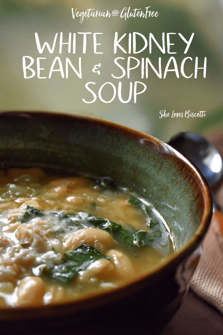 white kidney bean and spinach soup in a bowl