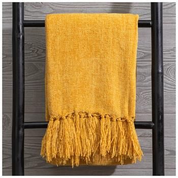 a yellow towel hanging on a black ladder