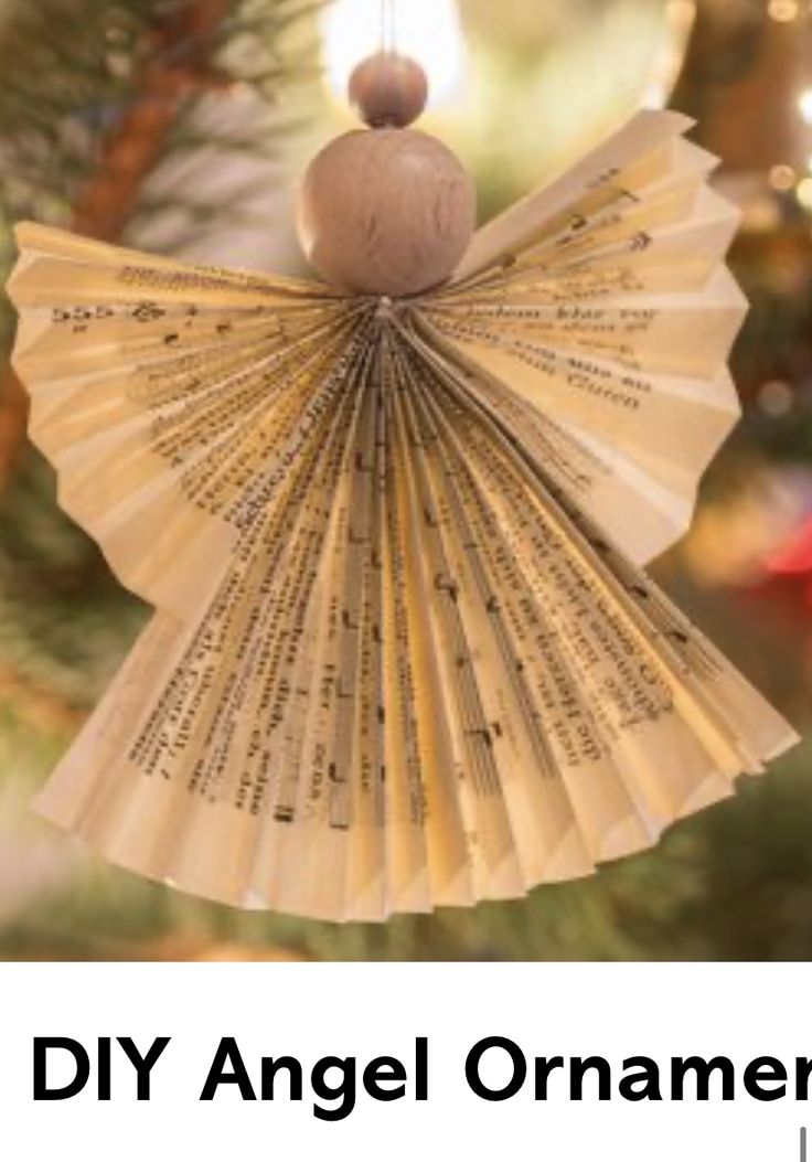 an angel ornament hanging from a christmas tree with the words diy angel ornaments on it