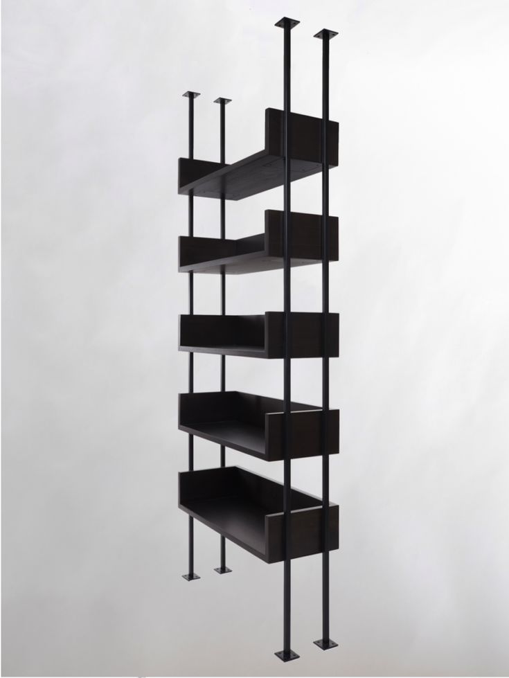 a tall black shelf with multiple shelves on each side and two metal poles in the middle