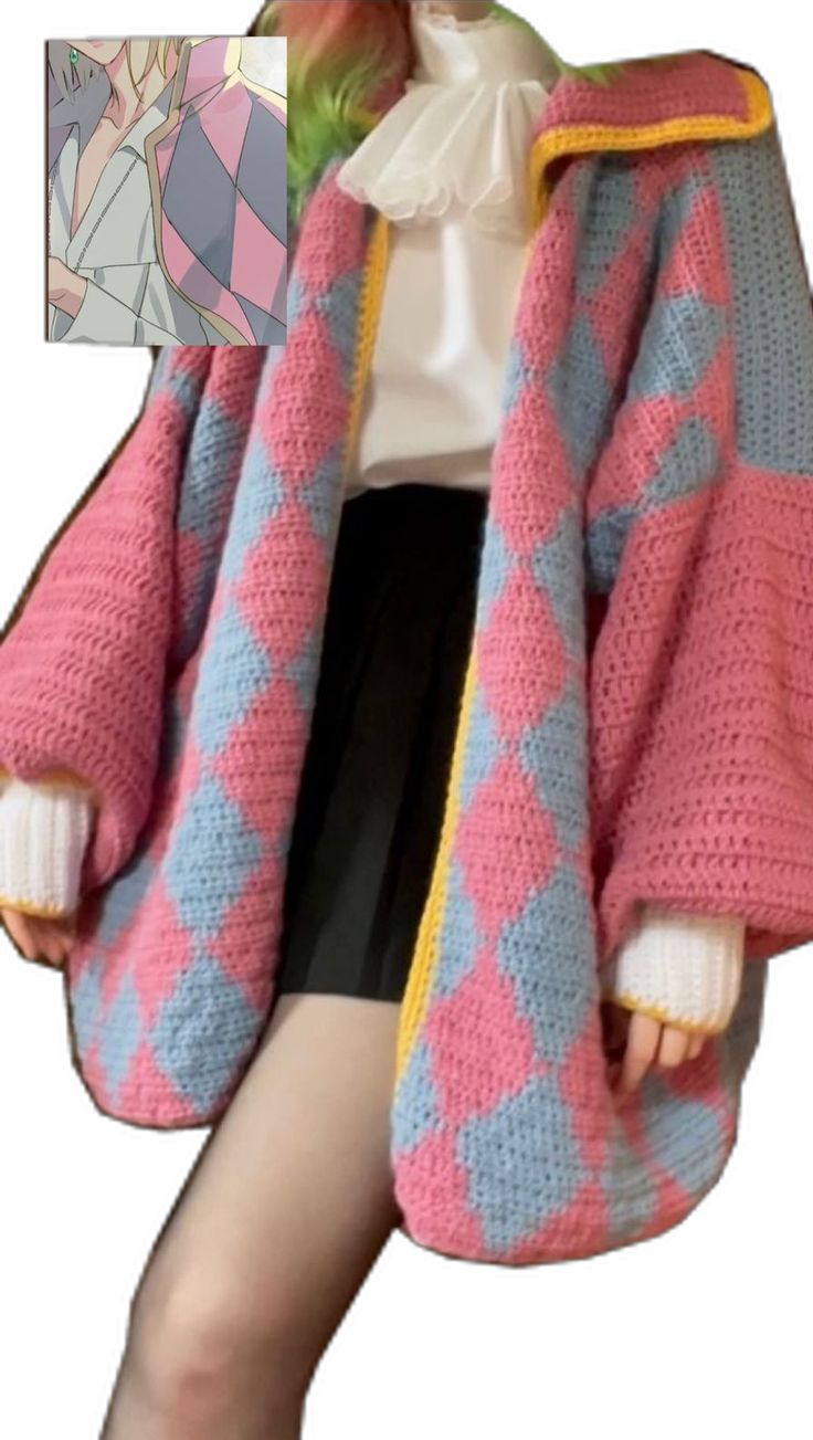 a woman wearing a pink and blue sweater with an open front jacket over her shoulders