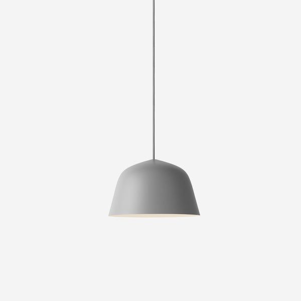 a gray light hanging from the ceiling