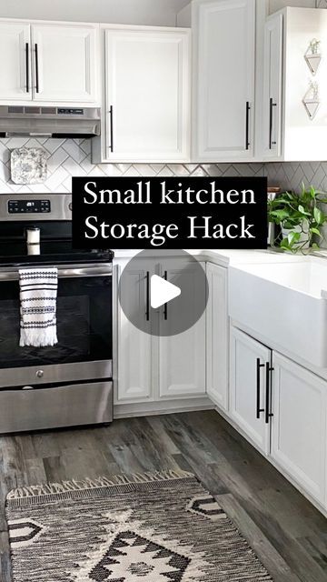 a kitchen with white cabinets and an area rug that says small kitchen storage hacks