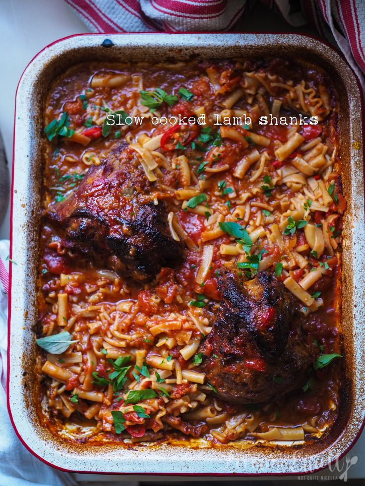 a casserole dish filled with meat and pasta