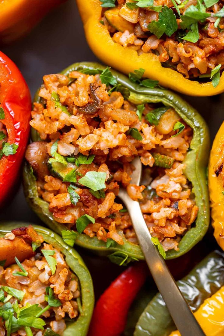 stuffed peppers with rice and vegetables in them