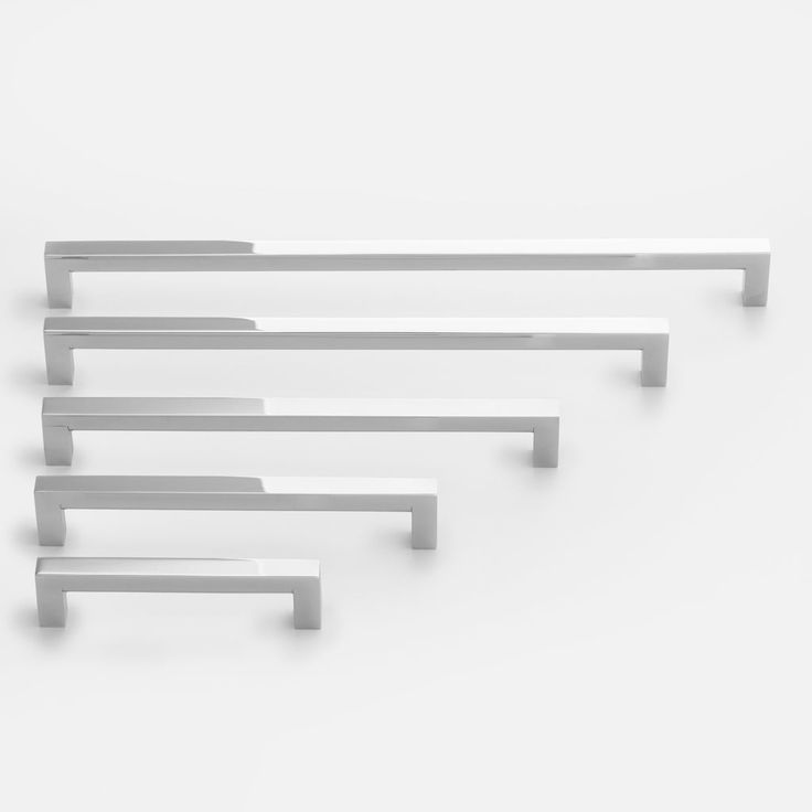 five white shelves are arranged in the shape of rectangles on a white background