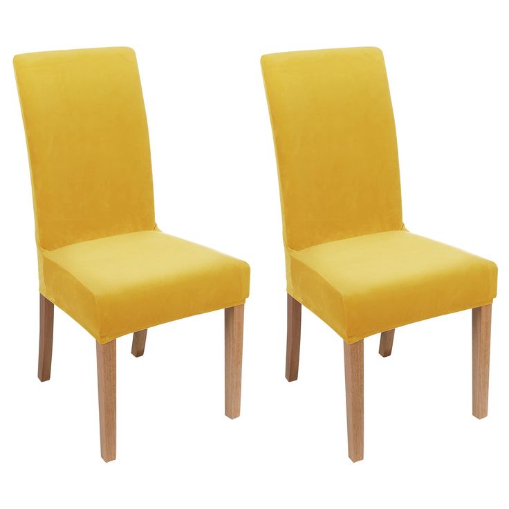 two yellow chairs sitting next to each other