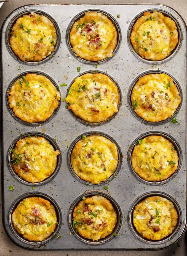 muffin tins filled with different types of breakfast foods