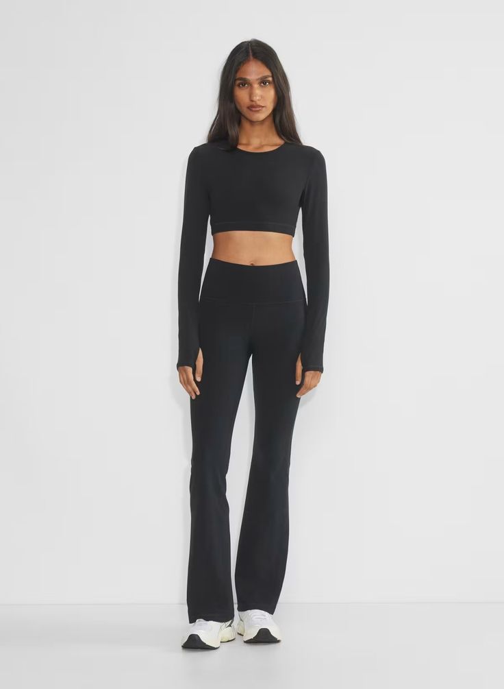 BUTTER NEW CHEEKY HI-RISE FLARE LEGGING | Aritzia Aritzia Flare Pants, Flared Workout Pants, Aritzia Flare Leggings, Aritzia Workout Set, 437 Activewear, Aritzia Leggings, Aritzia Outfit, Black Flared Leggings, Wide Leg Leggings