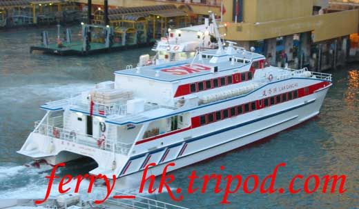 a large white and red boat in the water