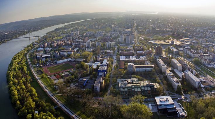 an aerial view of a city and river