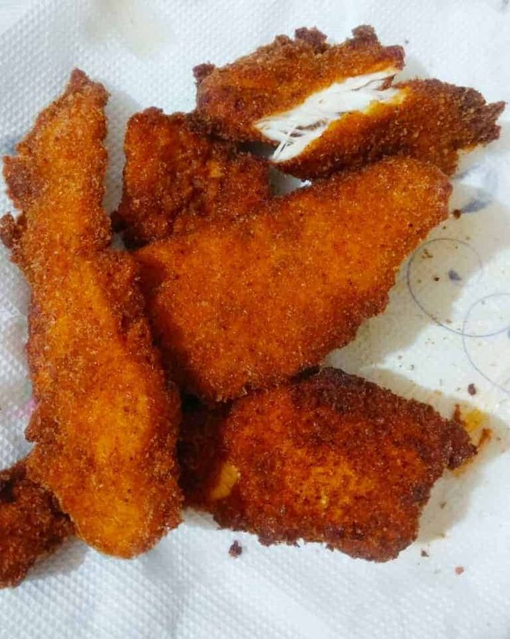 some fried food is sitting on top of a white paper towel and it looks like they have been eaten