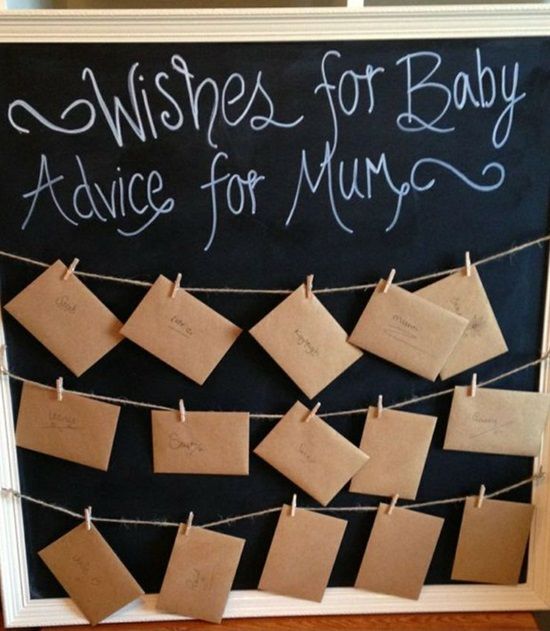 a chalkboard with notes attached to it that says wishes for baby advice for mums