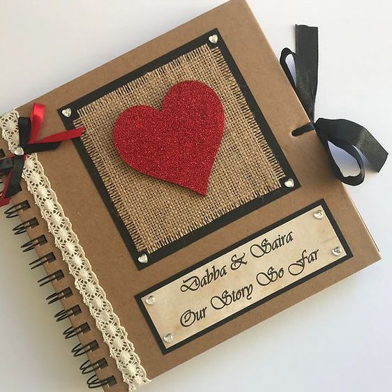 a brown book with a red heart on it