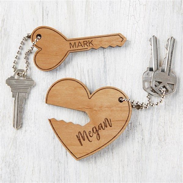 two wooden keychains with keys attached to them that say,'mr and mrs '