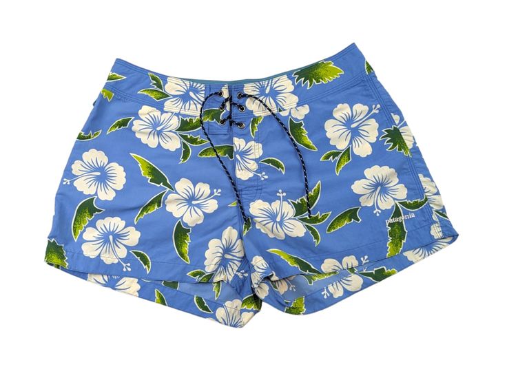 Vintage Patagonia Surf Shorts Women's Size 9 (See Measurements Below) Details:  Embroidered Patagonia on Leg Hook and Loop/Tie Closure White Hibiscus Flower Print Blue Boardshorts Tag Reads: Patagonia Women's Size 9 100% Nylon Style 86620 Fall 2000 Made in Thailand Measurements: Waist - 14" Hip - 19.5"" Inseam - 2" Rise - 9.5" Length - 12" Condition: EXCELLENT Vintage Condition - Minor Wear; No Flaws. Hibiscus Flower Print, Patagonia Vintage, Hawaiian Hibiscus, White Hibiscus, Patagonia Shorts, Surf Shorts, Vintage Patagonia, Shorts Style, Hibiscus Flower