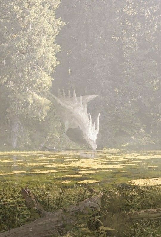 a large white dragon flying over a lush green forest