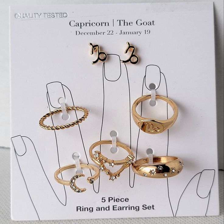 Astrology Zodiac Sign Jewelry Capricorn | The Goat December 22 - January 19 5 Rings (Various Sizes) 1 Pair Of Zodiac Sign Earrings The Rings Include: Twisted Band Zodiac Constelation Zodiac Symbol Signet Ring Moon And Stars Open Band Rhinestone Rhinestone Diamond Stars Ring New With Tags Gold Tone Capricorn Birthstone Ring, Symbolic Gold Rings With Zodiac Sign, Zodiac Sign Rings, Capricorn Earrings, White Gold Zodiac Sign Jewelry, Round Shape, December 22, Twisted Band, Zodiac Symbols, Zodiac Capricorn