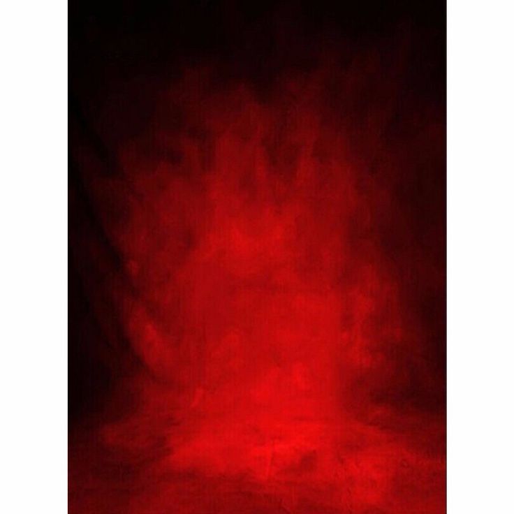 a red and black background with some light on it