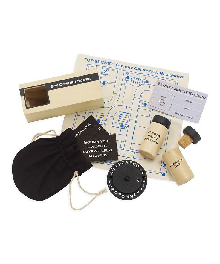 the contents of a travel kit including an envelope, luggage tag, and other items