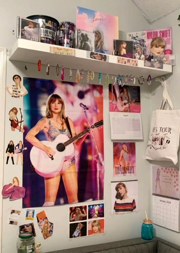 a wall with pictures, photos and magnets hanging on it's sides as well as a guitar