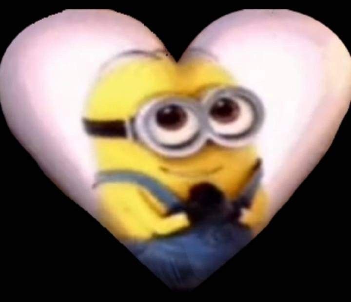 a heart shaped object with a minion inside