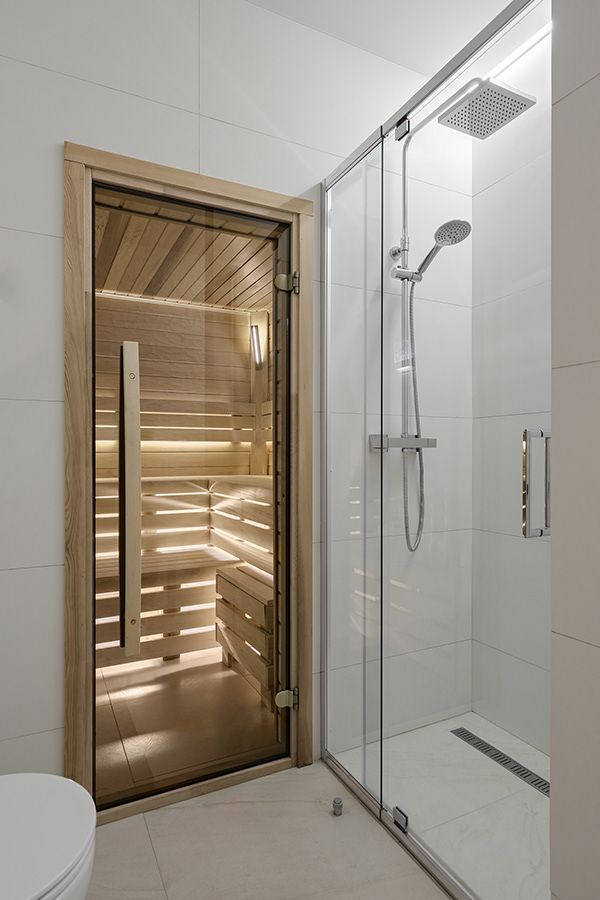 a bathroom with a sauna in the shower