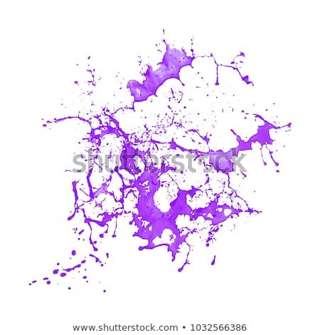 purple paint splattered on white background