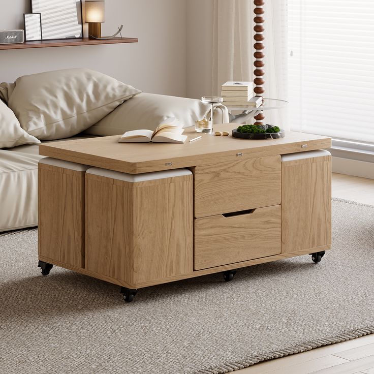 a living room scene with focus on the coffee table and storage unit in the middle